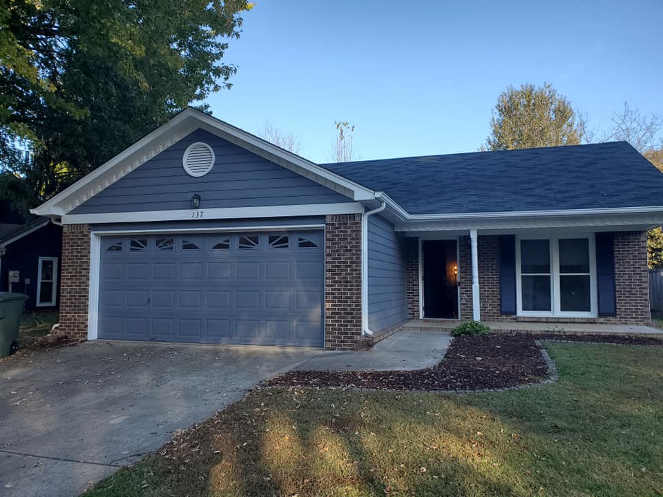 Tan garage carpentry build completed by Paint Pro